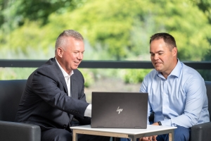 image of JD Buss showing curiosity about what a person he is working with thinks