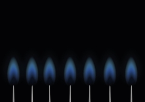 natural gas flames against a black background; Brazil's changing energy market