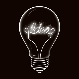 white outline of lightbulb on black background with idea in white inside lightbulb